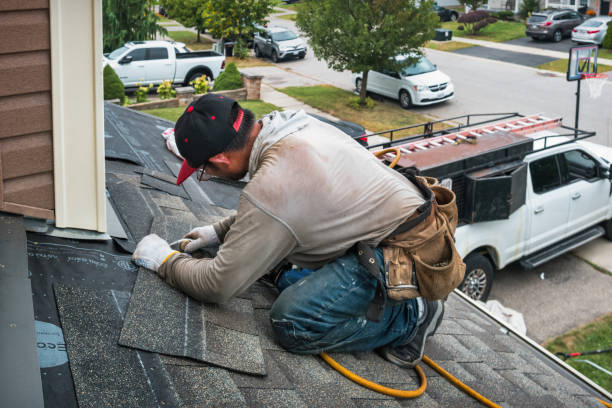 Professional Roofing technician working in Devens, MA